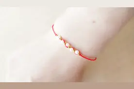 非常漂亮的珍珠红绳手链编法，新手都能学会视频封面