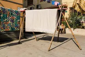 趁着秋高气爽，快把冬天的衣服洗洗晒晒，但这几点你要注意了图片