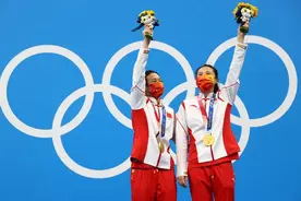 闪光从1991开始 施廷懋、王涵夺跳水女子双人3米跳板冠军图片