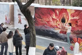 从线上火到线下！南昌街头“哪吒墙”引众人驻足打卡图片