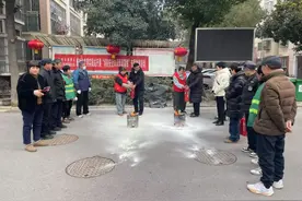 恒馨社区开展春季复工复产消防应急疏散逃生演练活动图片