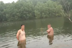 心情不好水库野泳？男子被困水中央图片